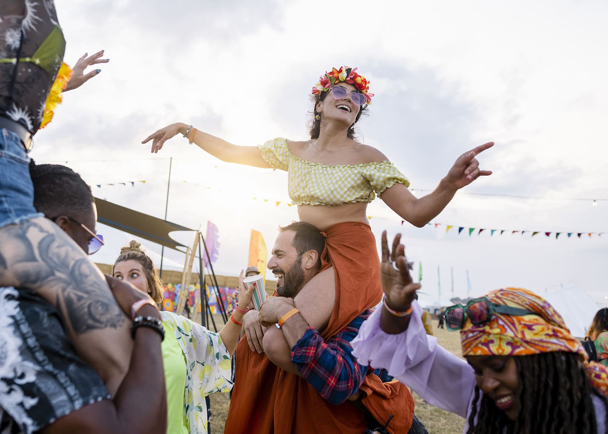 Sharing a Shoulder Carry at the Festival